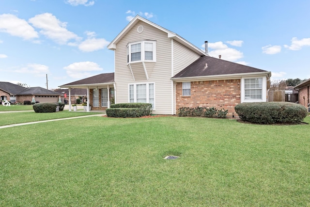 view of front facade with a front lawn