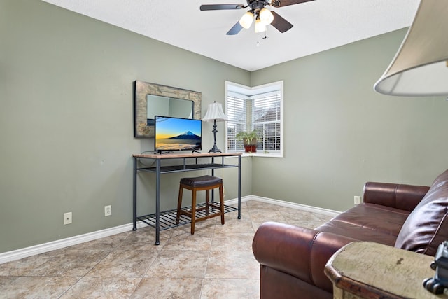 living room featuring ceiling fan