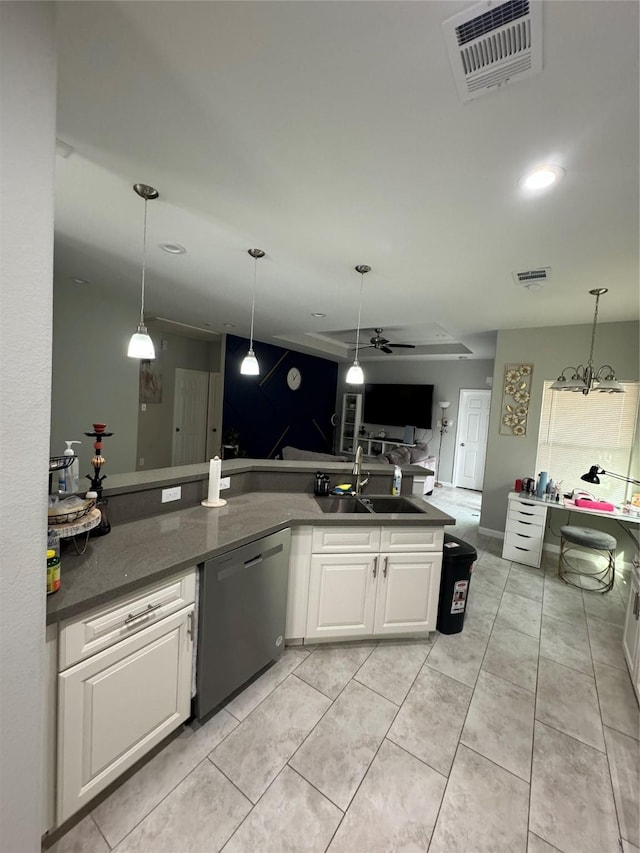 kitchen with white cabinets, dishwasher, ceiling fan, and hanging light fixtures