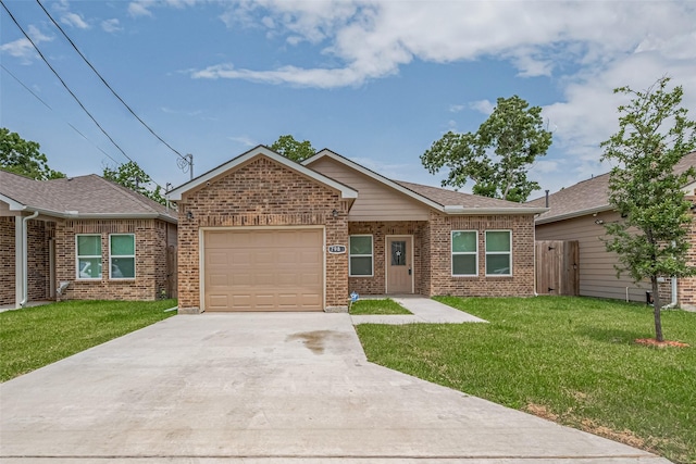 7981 Saint Louis St, Houston, TX 77028 - single story home featuring driveway, a garage, brick siding, and a front yard