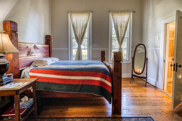 bedroom with light hardwood / wood-style floors