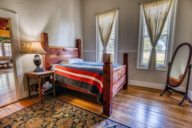 bedroom featuring wood-type flooring