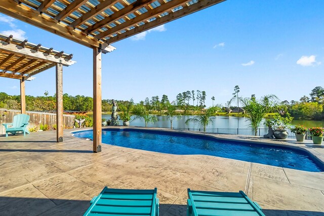 view of swimming pool featuring a patio area, a water view, and a pergola