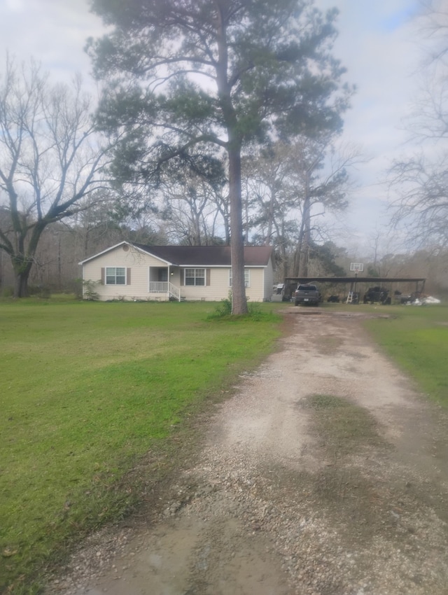 exterior space featuring a front lawn