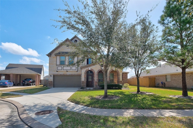 view of front of home with a garage, a front yard, and a carport