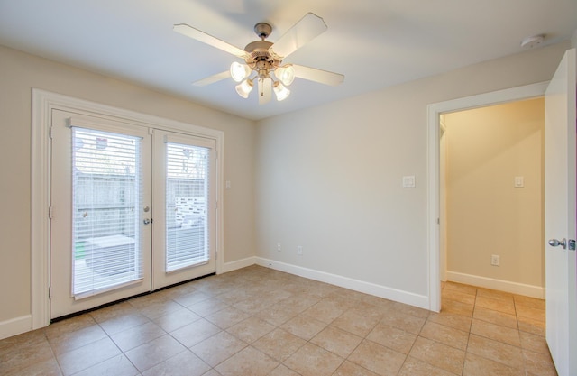 unfurnished room featuring light tile patterned floors, french doors, and ceiling fan