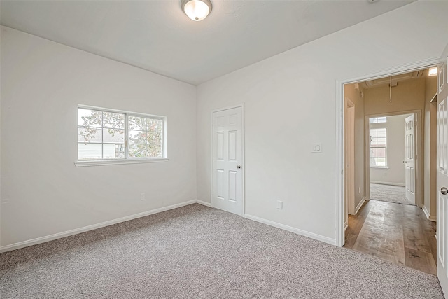 spare room featuring carpet