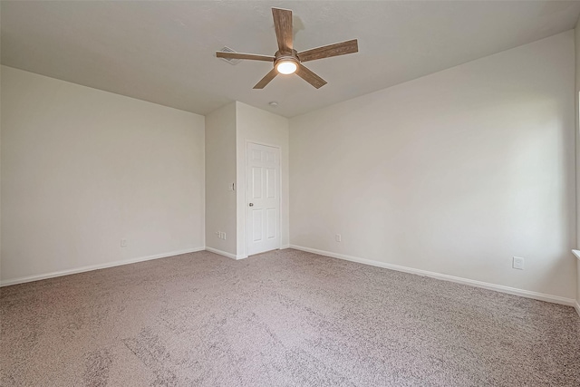 empty room with carpet and ceiling fan