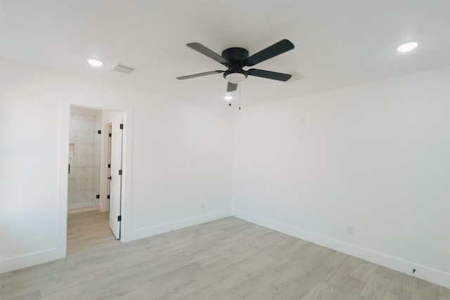 unfurnished room featuring ceiling fan and light hardwood / wood-style flooring