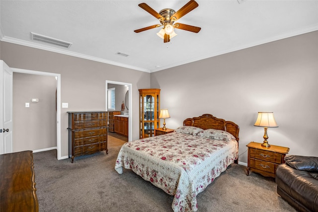 carpeted bedroom with ceiling fan, crown molding, and connected bathroom