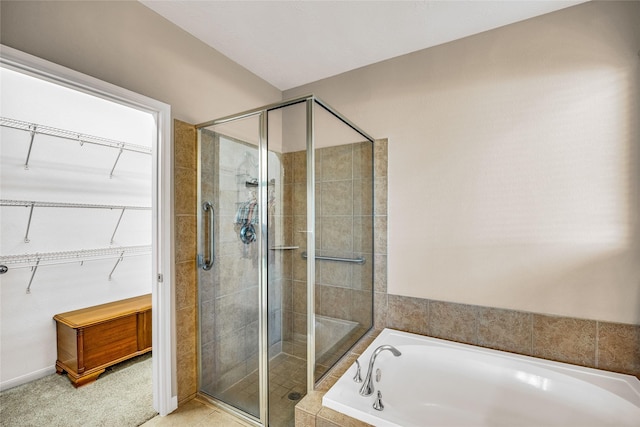 bathroom with independent shower and bath