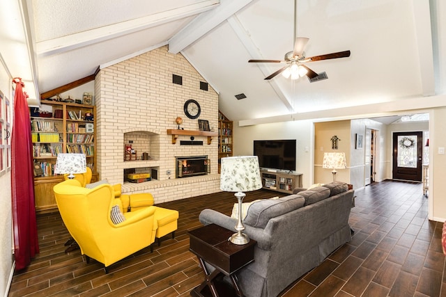 living room with a fireplace, beam ceiling, high vaulted ceiling, and ceiling fan