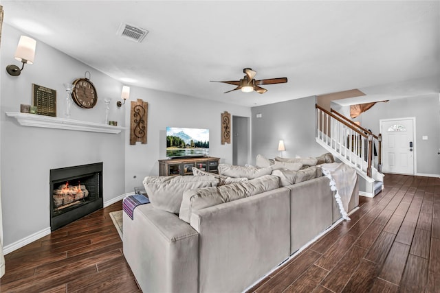 living room featuring ceiling fan