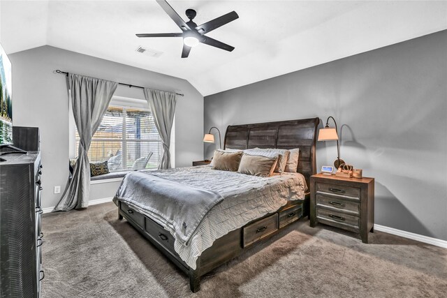 bedroom featuring dark colored carpet, ceiling fan, and vaulted ceiling