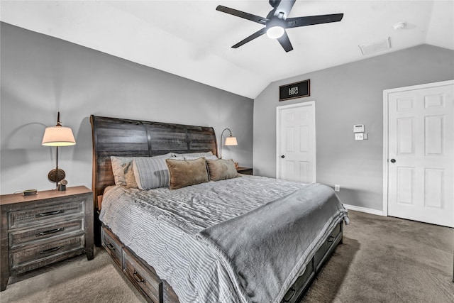 carpeted bedroom featuring ceiling fan and vaulted ceiling