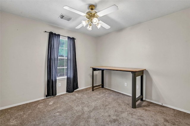 empty room with ceiling fan and light colored carpet