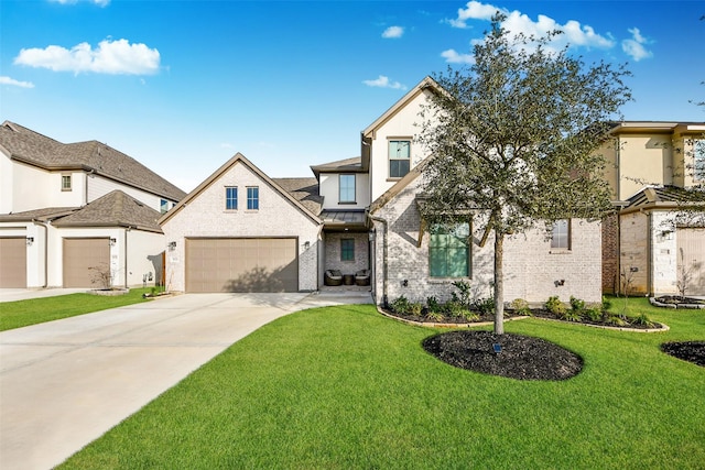 view of front facade featuring a garage and a front yard