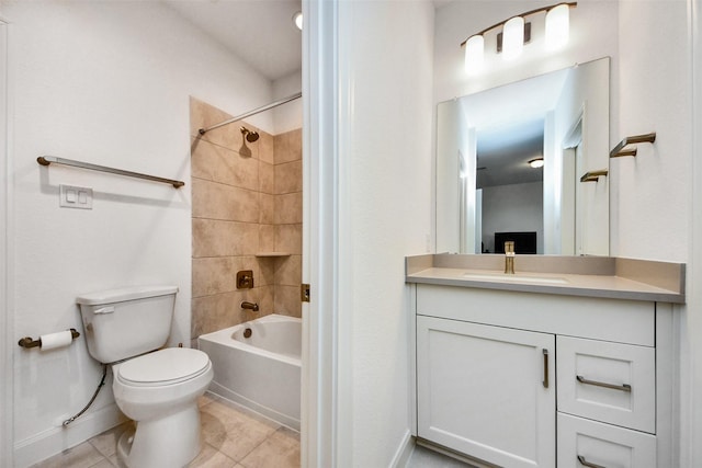 full bathroom featuring tile patterned flooring, vanity, toilet, and tiled shower / bath