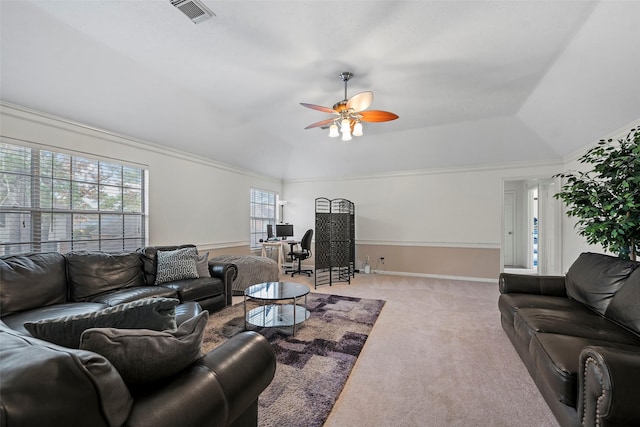 living room featuring crown molding, ceiling fan, and light carpet