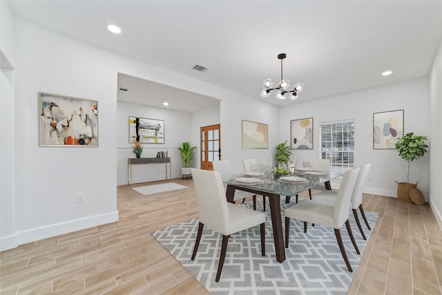 dining room featuring a notable chandelier