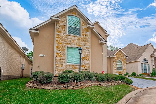 view of property with a front yard