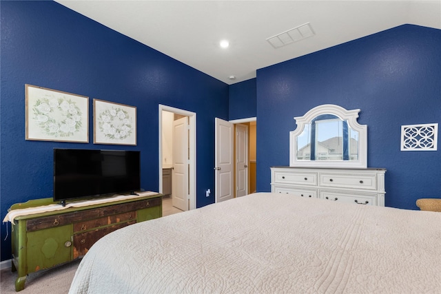 bedroom featuring light colored carpet