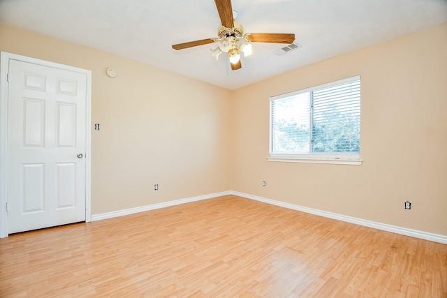 unfurnished room featuring ceiling fan and light hardwood / wood-style floors