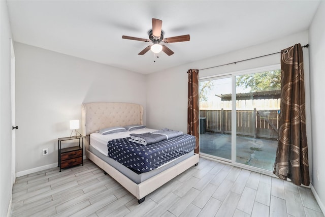 bedroom with access to exterior and ceiling fan