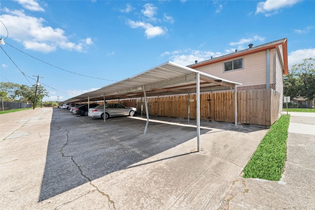 view of parking with a carport