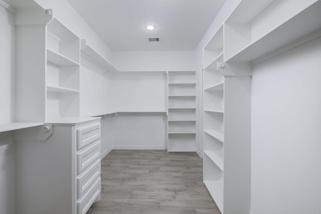 spacious closet with light wood-type flooring