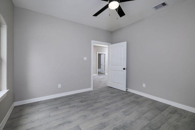 spare room with ceiling fan