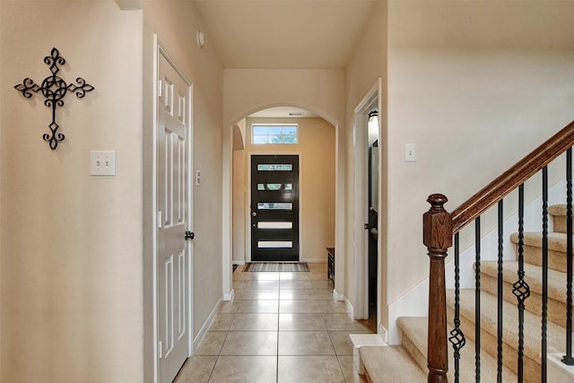 entrance foyer with light tile patterned flooring