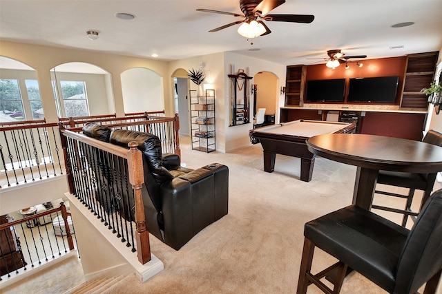 recreation room featuring light carpet, ceiling fan, and billiards