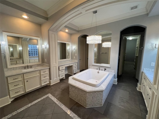 bathroom with vanity, tiled tub, tile patterned flooring, and ornamental molding