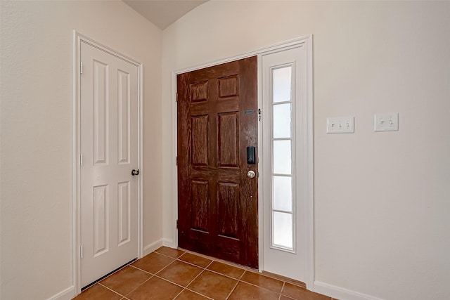 entrance foyer featuring tile patterned flooring