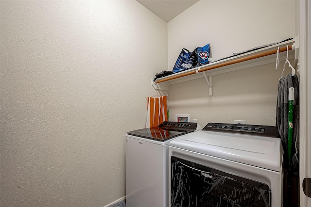 laundry room featuring separate washer and dryer