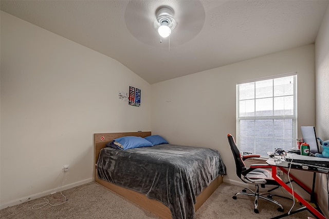 bedroom featuring light carpet, ceiling fan, and lofted ceiling