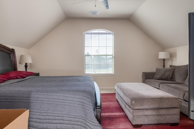 bedroom with ceiling fan and lofted ceiling