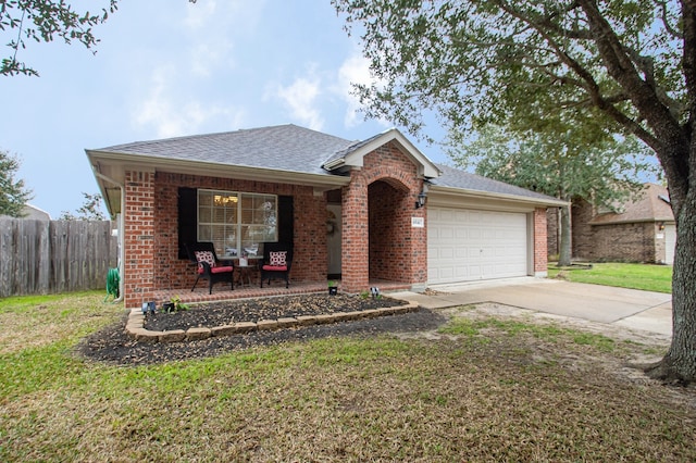 ranch-style house with a garage and a front lawn