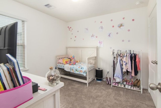 bedroom featuring light colored carpet