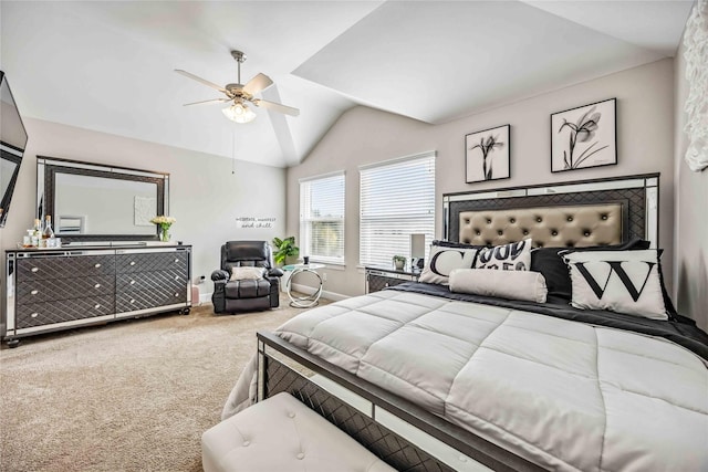 carpeted bedroom featuring ceiling fan and lofted ceiling