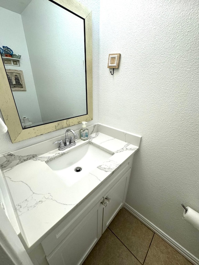 bathroom featuring tile patterned floors and vanity