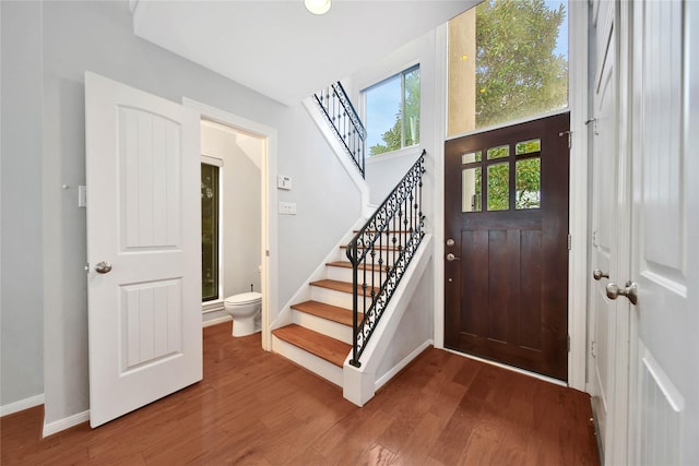 foyer entrance with hardwood / wood-style floors