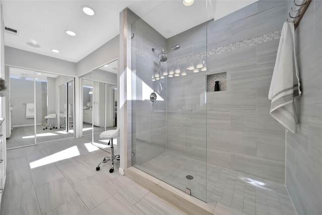 bathroom with a fireplace, toilet, and an enclosed shower