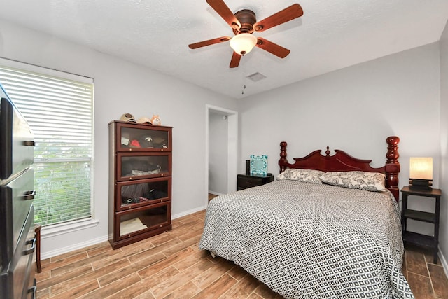 bedroom featuring ceiling fan