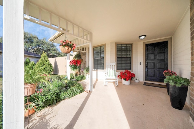 doorway to property with a patio area