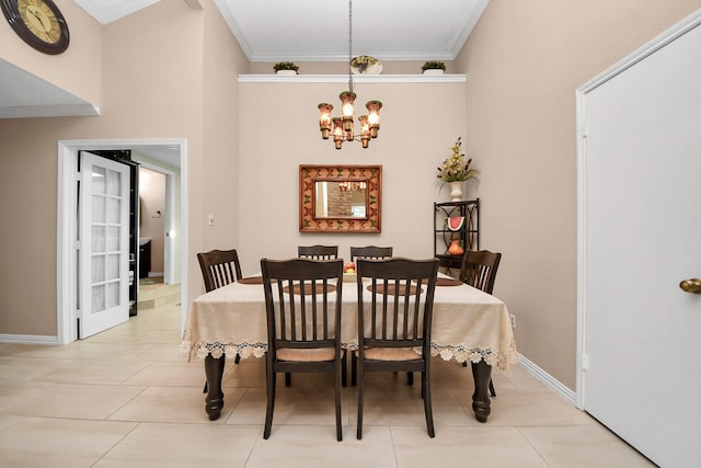 dining space featuring light tile patterned floors, crown molding, and a notable chandelier