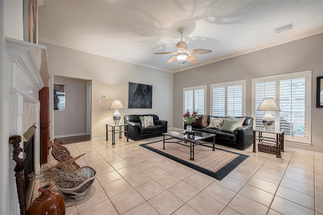 living room featuring light tile patterned floors, ceiling fan, and ornamental molding