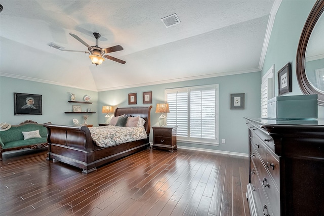 bedroom featuring ceiling fan, dark wood-type flooring, a textured ceiling, and lofted ceiling