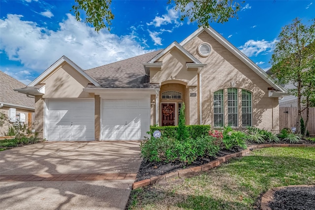 view of front of home with a garage